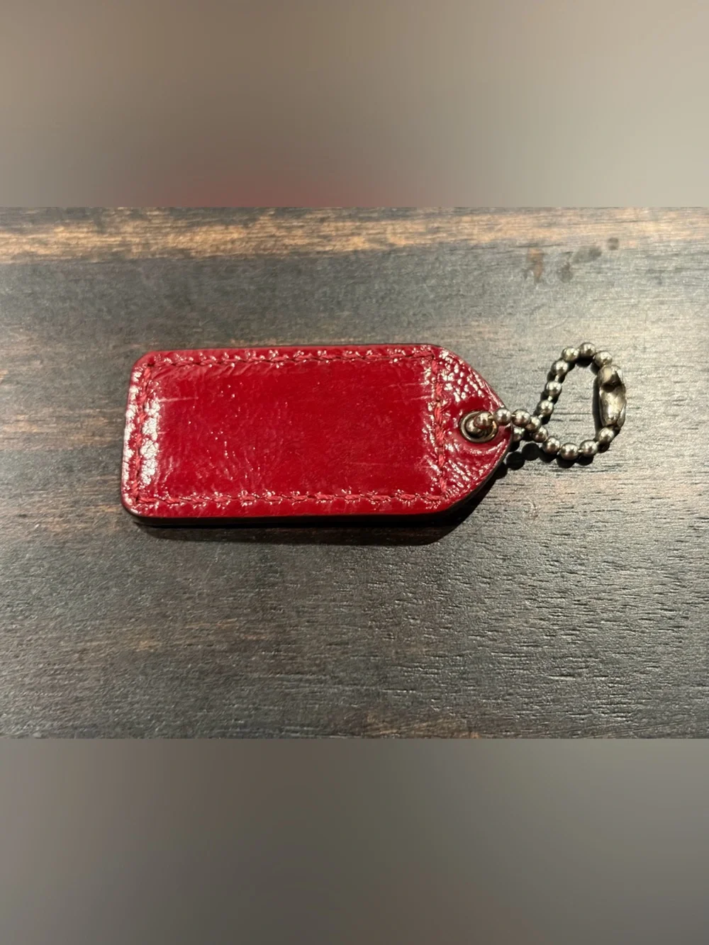 Red Coach Patent Leather Hangtag